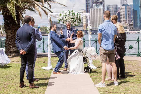 Couple getting married by Sydney harbour